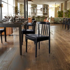 Sedia da pranzo commerciale in legno massello con sedile imbottito in vinile